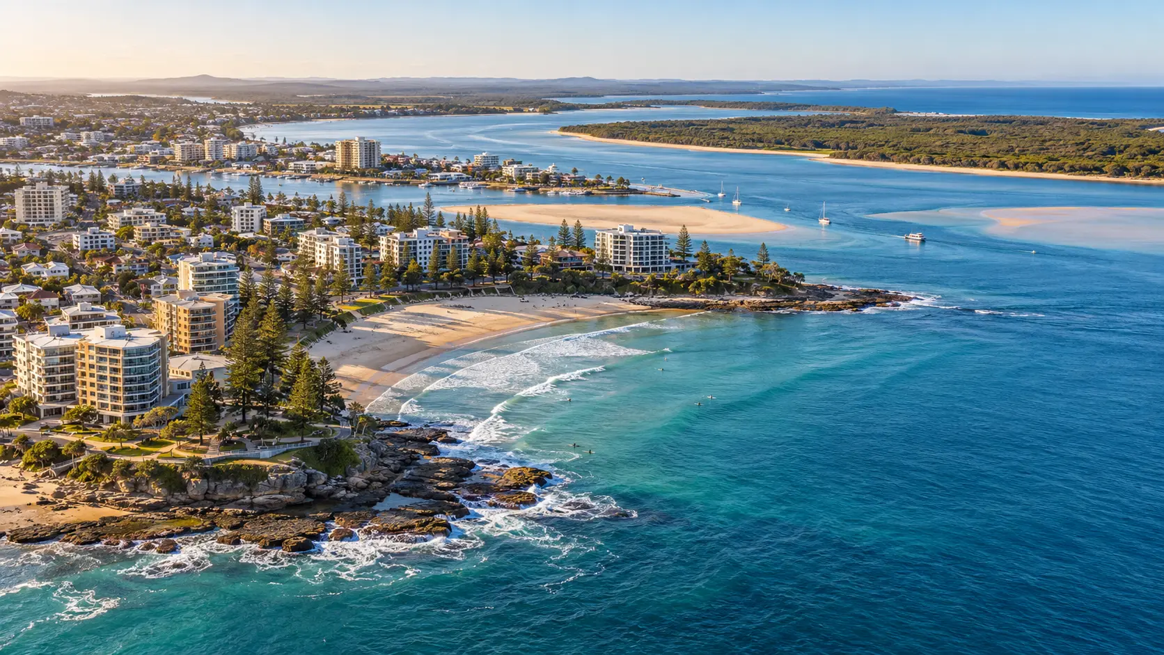 Aerial view across Caloundra's coastline, Pumicestone Passage and Bribie Island